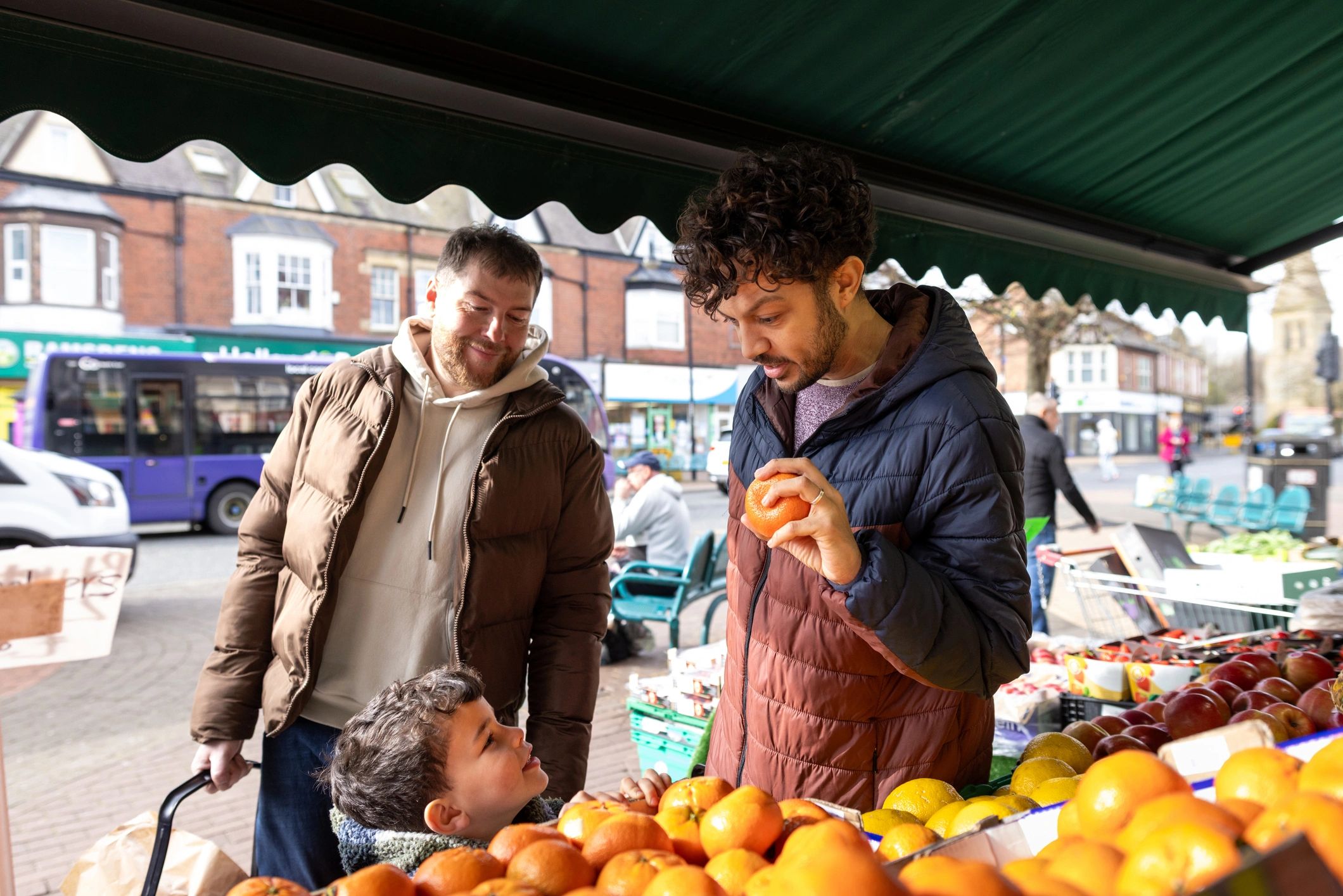 Shoppers at an outdoor market