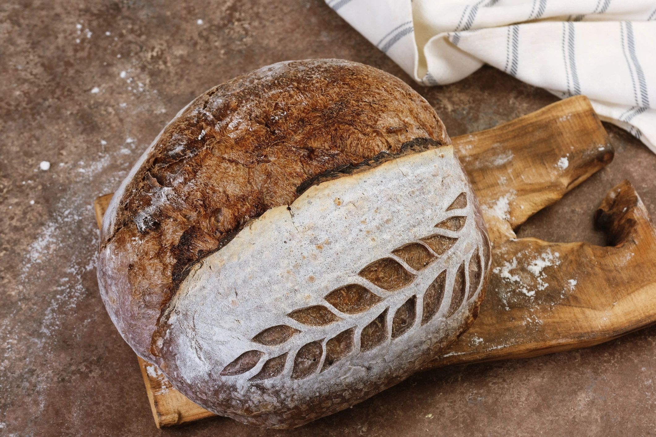 Artisan sourdough loaf on a wooden board
